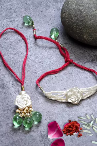 Bhaiya and bhabhi Rakhi with roli and chawal