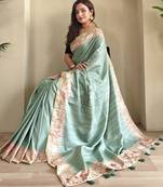 sea green tussar saree with pichwai style embroidery