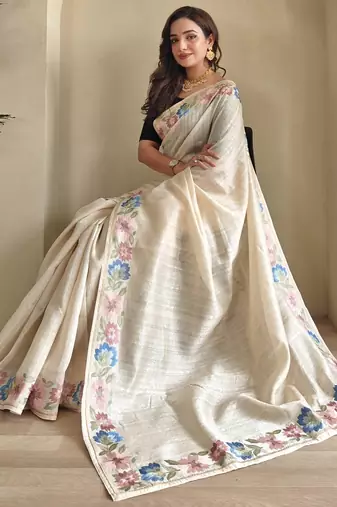 cream tussar saree with contrast embroidery