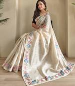 cream tussar saree with contrast embroidery
