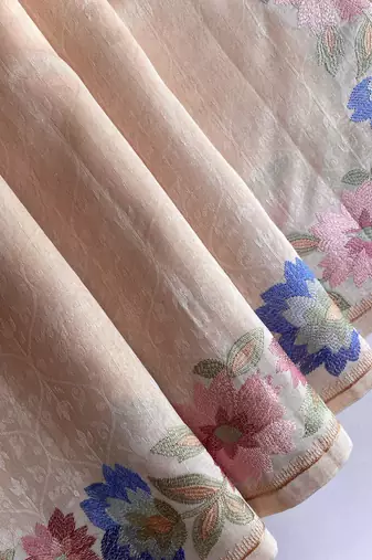 cream tussar saree with contrast embroidery