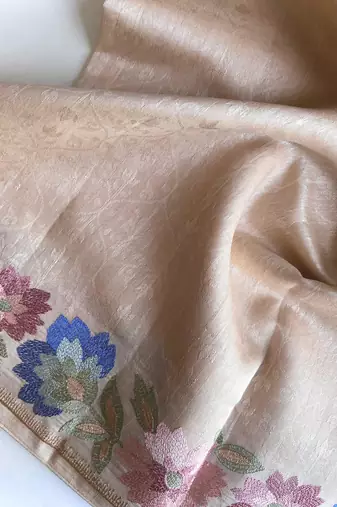 cream tussar saree with contrast embroidery