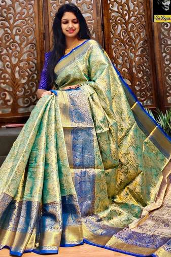 embroidered bollywood silk blend saree (green blue)