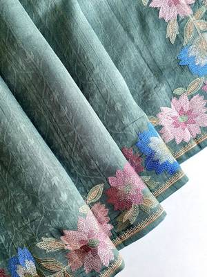 sea green tussar saree with contrast embroidery 6