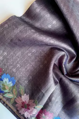 grey tussar saree with contrast embroidery
