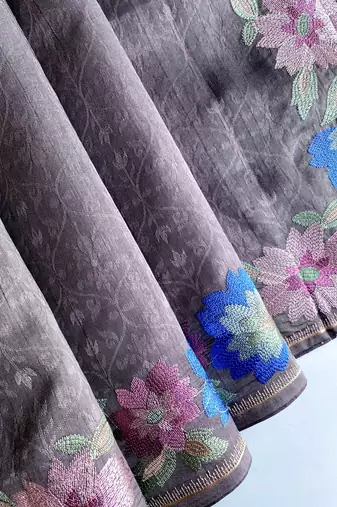 grey tussar saree with contrast embroidery