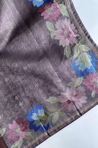 grey tussar saree with contrast embroidery