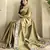 green tussar saree with contrast embroidery