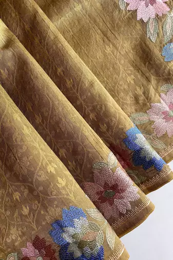 green tussar saree with contrast embroidery