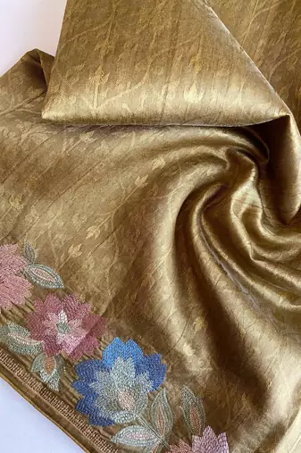 green tussar saree with contrast embroidery
