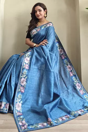 teal tussar saree with contrast embroidery