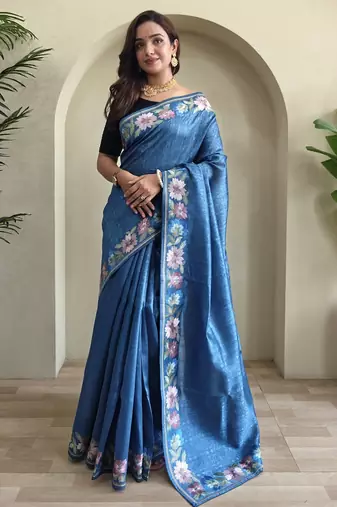 teal tussar saree with contrast embroidery