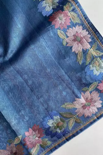 teal tussar saree with contrast embroidery