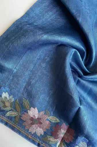 teal tussar saree with contrast embroidery