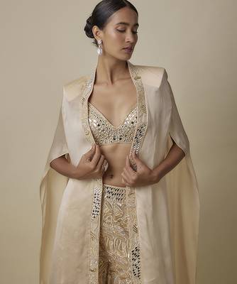 Beige satin embroidered pant and blouse paired with plain cape 3