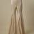 Beige satin plain blouse and pant paired with embroidered cape