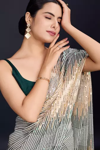 cream Embellished georgette saree with unstitched blouse
