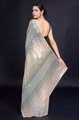 cream Embellished georgette saree with unstitched blouse