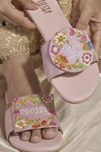 Purple embroidered leather flats