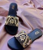Black embroidered leather flats