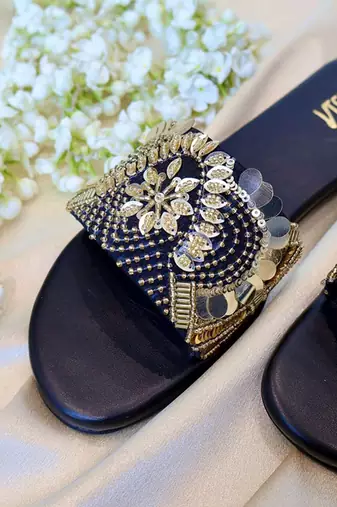 Black embroidered leather flats