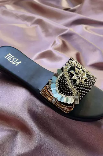 Black embroidered leather flats