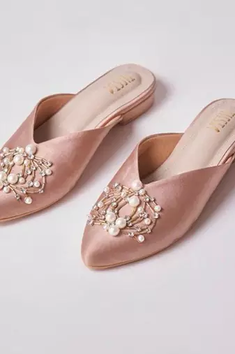 Pink embroidered leather flats