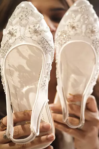White embroidered leather flats
