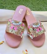 Pink embroidered leather flats