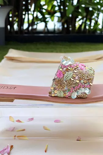 Pink embroidered leather flats