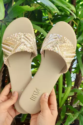 Beige embroidered leather flats