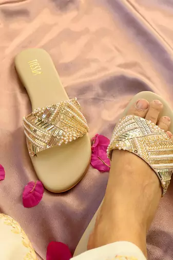 Beige embroidered leather flats