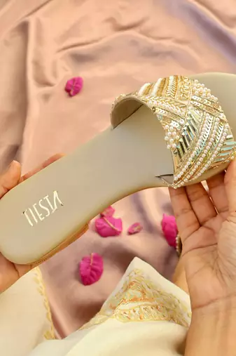 Beige embroidered leather flats