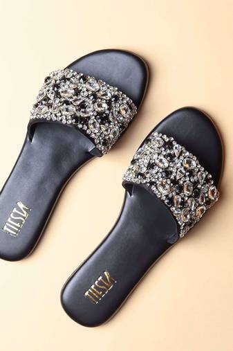 Black embroidered leather flats
