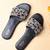 Black embroidered leather flats