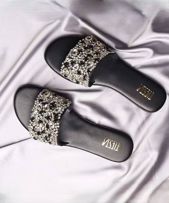 Black embroidered synthetic leather flats 1