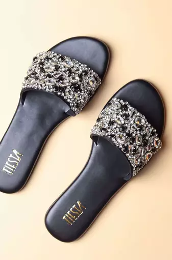 Black embroidered synthetic leather flats