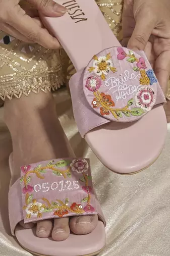 Purple embroidered leather flats