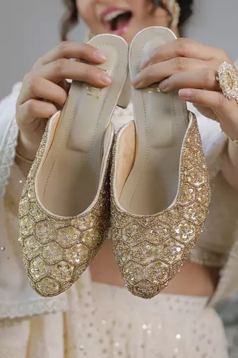 Gold woven synthetic leather heels