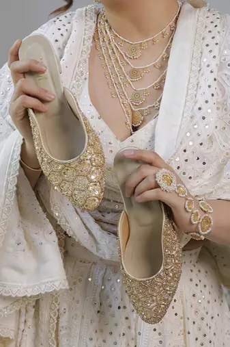 Gold woven synthetic leather heels