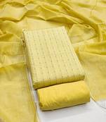 Yellow printed cotton salwar suit material with subtle striped dupatta
