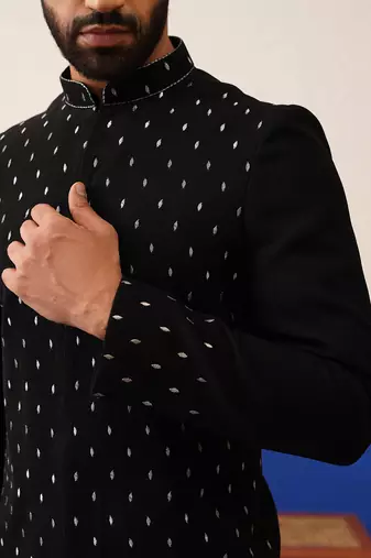 Jiggar thakkar in plain simmer black kurtas