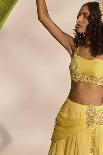 yellow plain organza lehenga with embroidered blouse