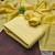 Yellow printed cotton salwar suit material with subtle striped dupatta