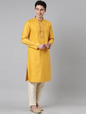 Mustard embroidered kurtas 4