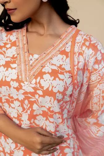 Women's Orange Cotton floral print kurta set with dupatta & trouser