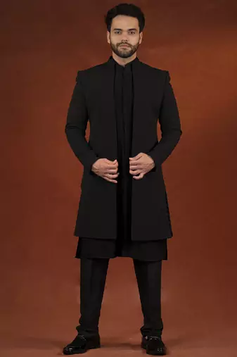 Anupam kher in black shimmer jacket kurta set