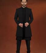 Anupam kher in black shimmer jacket kurta set