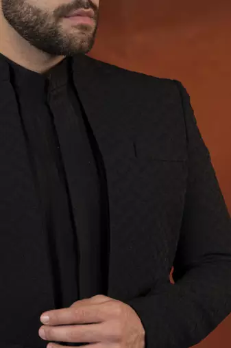 Anupam kher in black shimmer jacket kurta set