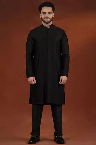 Anupam kher in black shimmer jacket kurta set